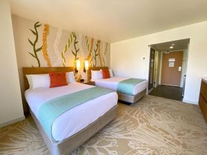 Postel nebo postele na pokoji v ubytování Ala Moana Hotel 13th FL Partial Ocean View + 14 fotografií