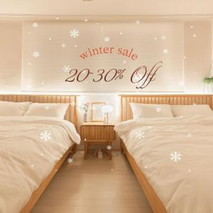 Una cama o camas en una habitación de Nldam Stay Seoul Station Walk 8min Near Namsan Tower, Easy to Hongdae, Myeongdong,DDP