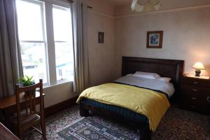 Postel nebo postele na pokoji v ubytování Lochiel House