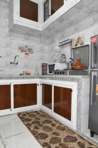 Η κουζίνα ή μικρή κουζίνα στο Lacote Apartment In Salè