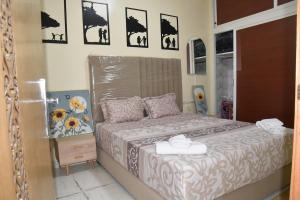 Ένα ή περισσότερα κρεβάτια σε δωμάτιο στο Lacote Apartment In Salè