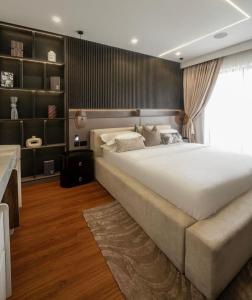 Ένα ή περισσότερα κρεβάτια σε δωμάτιο στο Atlan luxury Apartment