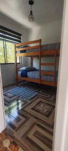 Postel nebo postele na pokoji v ubytování Cabañas Amancay