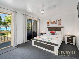 Ένα ή περισσότερα κρεβάτια σε δωμάτιο στο Shell Cove by Charlesworth +18 φωτογραφίες