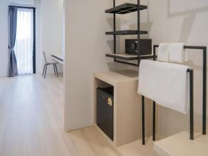 Η κουζίνα ή μικρή κουζίνα στο Louis Residence Hotel