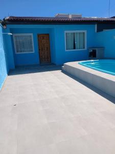 Πισίνα στο ή κοντά στο casa de praia em Matinhos