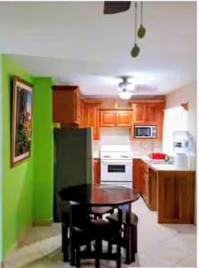 Η κουζίνα ή μικρή κουζίνα στο Paradise suites &residence