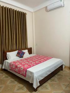 Ένα ή περισσότερα κρεβάτια σε δωμάτιο στο Kim dat hotel