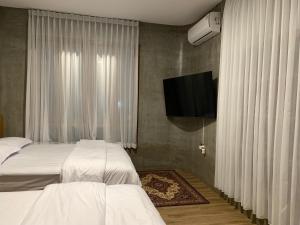 Ένα ή περισσότερα κρεβάτια σε δωμάτιο στο Alena Villa Private Pool