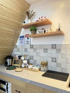 Η κουζίνα ή μικρή κουζίνα στο Quatra Belle Villa