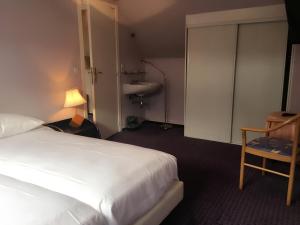 Letto o letti in una camera di Hotel Claridge