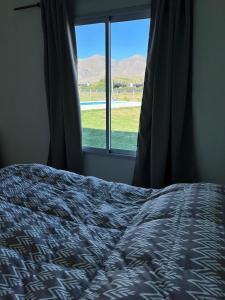 En eller flere senge i et værelse på Casa Fika