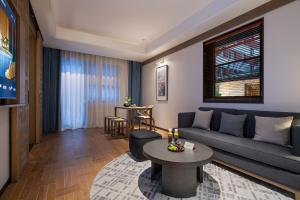 TV a/nebo společenská místnost v ubytování Manxin Mansion, Tiananmen Square, Forbidden City, Beijing