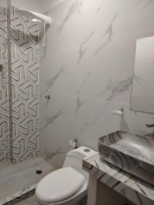 Et badeværelse på Departamento Vacacional