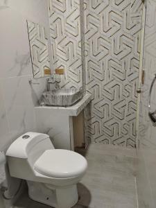 Et badeværelse på Departamento Vacacional + 7 billeder