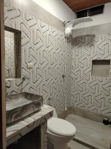 Et badeværelse på Departamento Vacacional