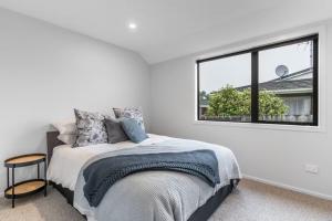 En eller flere senge i et værelse på New Townhouse on Clyde St Winton