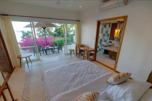 Ένα ή περισσότερα κρεβάτια σε δωμάτιο στο Villa Molas Mongko