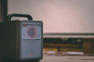 a radio sitting on a table in front of a tv at "Maruki Saifuku" Japanese traditional house in Kakuda +13 photos