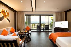 Un pat sau paturi într-o cameră la Amiana Resort Cam Ranh +197 fotografii