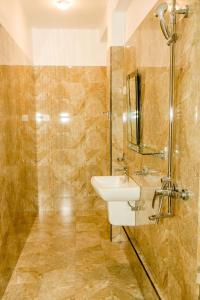 a bathroom with a sink and a shower at Shan Resort in Gintota +48 photos