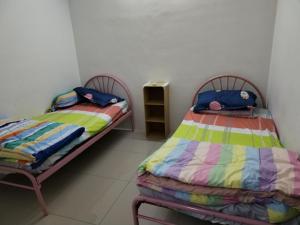 Ένα ή περισσότερα κρεβάτια σε δωμάτιο στο 交通方便，附近大型商场，selesa dan dekat shopping