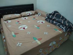 Ένα ή περισσότερα κρεβάτια σε δωμάτιο στο 交通方便，附近大型商场，selesa dan dekat shopping