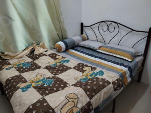 Ένα ή περισσότερα κρεβάτια σε δωμάτιο στο 交通方便，附近大型商场，selesa dan dekat shopping