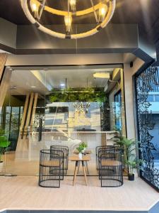 Φωτογραφία από το άλμπουμ του โรงแรมเดอะไนน์ พรีเมียร์ σε Ban Na Khwai