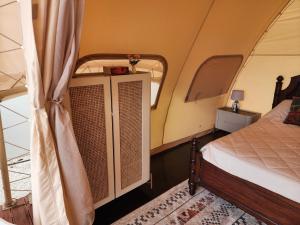 Ένα ή περισσότερα κρεβάτια σε δωμάτιο στο A Slice of Paradise