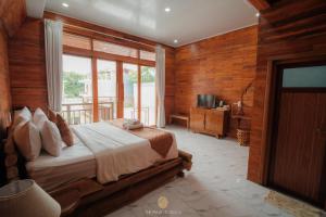 En eller flere senge i et værelse på The Maja Villa Uluwatu + 24 billeder