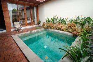 Swimmingpoolen hos eller tæt på The Maja Villa Uluwatu