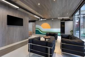 TV a/nebo společenská místnost v ubytování Sunset Residence & Hotel Batumi