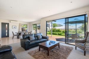 Et opholdsområde på Dragonfly Cottage