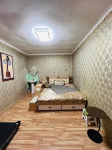 Ένα ή περισσότερα κρεβάτια σε δωμάτιο στο Mandakh Naran Guest House