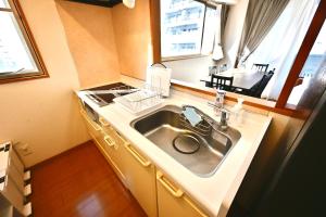 Nhà bếp/bếp nhỏ tại コングラッツ湘南 +103 ảnh