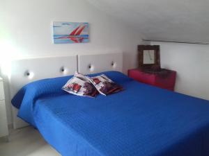 Posteľ alebo postele v izbe v ubytovaní Casa dei Fenicotteri