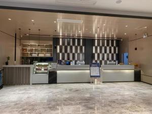 Ο χώρος του λόμπι ή της ρεσεψιόν στο Echarm Hotel Changjiang Shilu