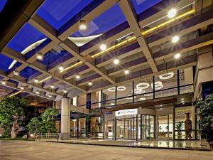 a view of a shopping mall at night at Pullman Xiamen Powerlong in Xiamen