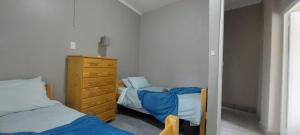 Ένα ή περισσότερα κρεβάτια σε δωμάτιο στο Kirkcaldy Guest House