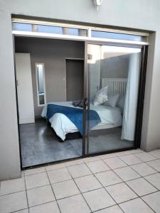 Ένα ή περισσότερα κρεβάτια σε δωμάτιο στο Kirkcaldy Guest House