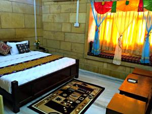 Hotel Classic Jaisalmerにあるベッド