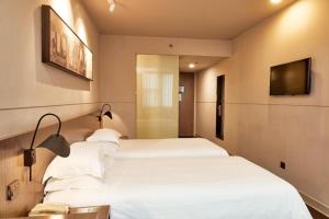 TV a/nebo společenská místnost v ubytování Jinjiang Inn Select Shenyang Railway Station South Taiyuan Street