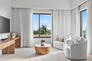 Μια τηλεόραση ή/και κέντρο ψυχαγωγίας στο Beautiful PH apartment in Punta Mita, acces beach Club