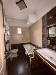 Koupelna v ubytování Kötél apartman + 17 fotografií