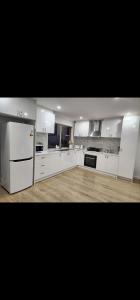 Køkken eller tekøkken på Welcome Home Stay