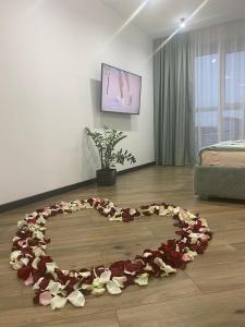 Ένα ή περισσότερα κρεβάτια σε δωμάτιο στο Сучасні апартаменти в районі автовокзалу ЖК Great House,поруч обласна лікарня,центр +9 φωτογραφίες