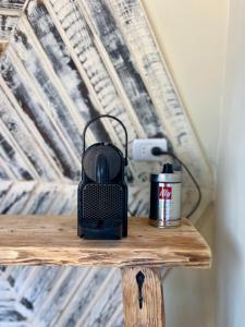 a black router sitting on top of a wooden table at Mannam desert dome in Dahab