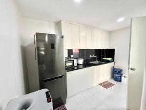 Η κουζίνα ή μικρή κουζίνα στο The Happy Home HQ