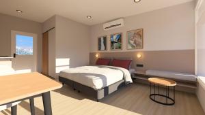 Postel nebo postele na pokoji v ubytování Hótel Stuðlagil Canyon